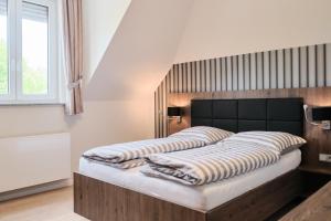 Katil atau katil-katil dalam bilik di Beisenbusch Hotel & Restaurant