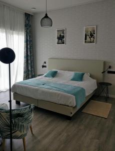 Postel nebo postele na pokoji v ubytování B & B De Veurnse Slaper