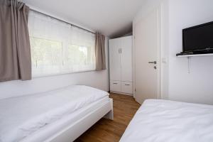 Postel nebo postele na pokoji v ubytování Ferienhaus Prasl