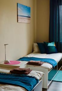 A bed or beds in a room at Neptune Ear, Family-friendly, modern, fully-equipped, cozy apartment