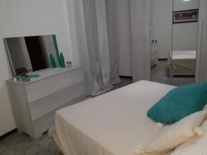 Posteľ alebo postele v izbe v ubytovaní Casa GIOVANNA