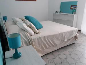 Posteľ alebo postele v izbe v ubytovaní Casa GIOVANNA