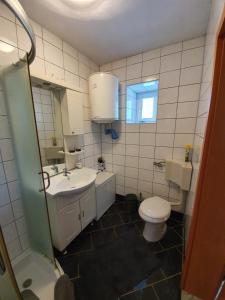 Kúpeľňa v ubytovaní Private Accommodation Kanegra