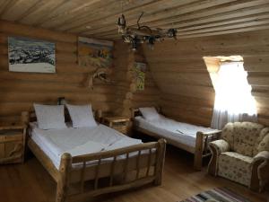 Ліжко або ліжка в номері Будинок Художника Шипіт