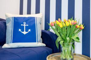 Posedenie v ubytovaní Apartament 12B Niebieskie Apartamenty Poddąbie dawniej Blue Marine z basenem krytym, odkrytym, salą zabaw, animacjami