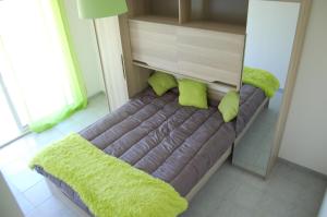 Ein Bett oder Betten in einem Zimmer der Unterkunft Villa Carignans