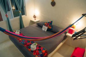 Cama o camas de una habitación en Corazon Mexicano Holbox