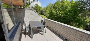 Balkón nebo terasa v ubytování Côté terrasse