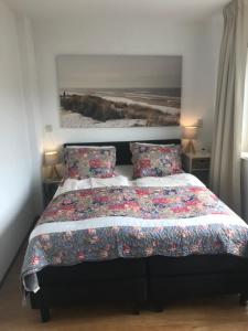 Een bed of bedden in een kamer bij Ludana