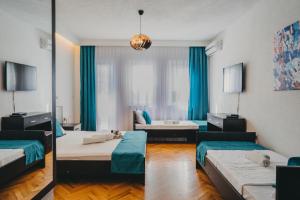 מיטה או מיטות בחדר ב-Villa Stefano