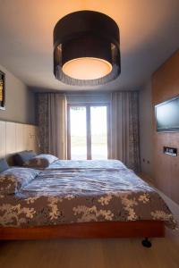 Postel nebo postele na pokoji v ubytování Vila Petra + 26 fotografií