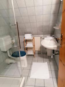 Ein Badezimmer in der Unterkunft Ferienwohnungen Kössl