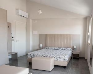 En eller flere senge i et værelse på Civico 43c