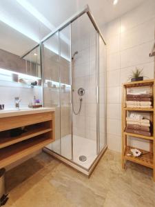 Koupelna v ubytování Appartements-Pension Reinstadler + 31 fotografií