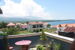a view from the balcony of a house at Sony Home Stay in Amed