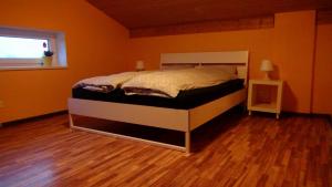 Postel nebo postele na pokoji v ubytování Holiday House Koceri