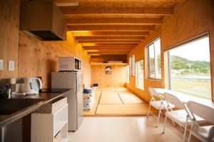 Kuchyň nebo kuchyňský kout v ubytování Sunset Breeze Hota + 22 fotografií