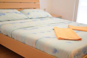 Cama o camas de una habitación en Nikola Apartments