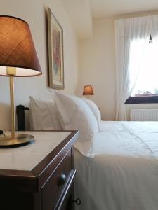 A bed or beds in a room at House with View in Amfithea