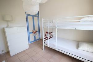 Postel nebo postele na pokoji v ubytování Adorable maison de vacances plain pied au coeur de la station et proche des plages 4 chambres, jardin, WIFI, LXDUNE1