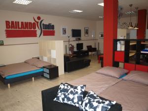 Letto o letti in una camera di BAILANDO Studio