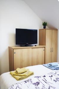 Postel nebo postele na pokoji v ubytování Apartma Pegaz