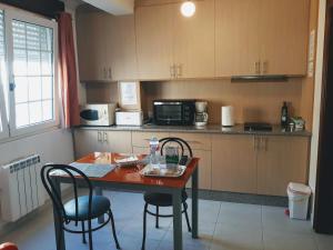 Dapur atau dapur kecil di Apartamentos Ferrol +9 gambar