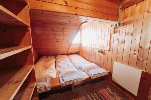 Кровать или кровати в номере Obere Maxlraineralm