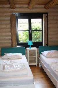 Ένα ή περισσότερα κρεβάτια σε δωμάτιο στο Chalet 294 - Krabbenkreek
