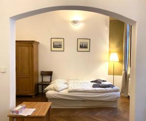 Posteľ alebo postele v izbe v ubytovaní Apartmány Nerudova 36