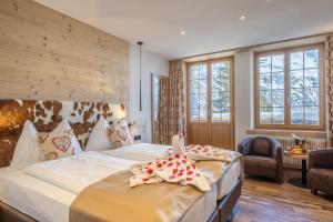 Voodi või voodid majutusasutuse Hotel Alpenruh toas