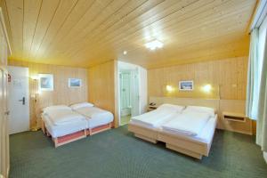 Voodi või voodid majutusasutuse Hotel Alpenruh toas