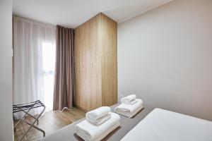 Säng eller sängar i ett rum på GBH Hotel-Apartamentos Caballito de Mar