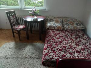 
Łóżko lub łóżka w pokoju w obiekcie Słoneczny apartament z balkonem

