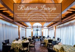 Reštaurácia alebo iné gastronomické zariadenie v ubytovaní Hotel Lucrezia Borgia
