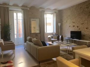 TV a/nebo společenská místnost v ubytování Impresionante ático dúplex Catalans