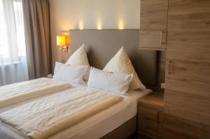 Postel nebo postele na pokoji v ubytování Hotel Morjan