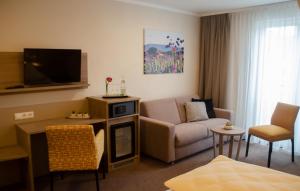 TV a/nebo společenská místnost v ubytování Hotel Morjan