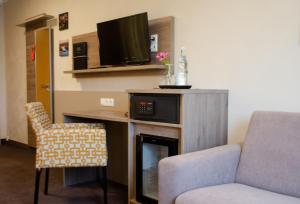 Kuchyň nebo kuchyňský kout v ubytování Hotel Morjan