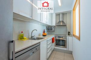 Kuchyňa alebo kuchynka v ubytovaní Paradís Platja Apartment