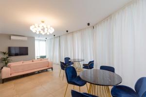 TV a/nebo společenská místnost v ubytování Hotel Lifetime
