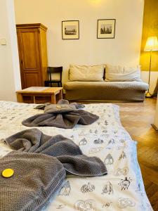 Posteľ alebo postele v izbe v ubytovaní Apartmány Nerudova 36