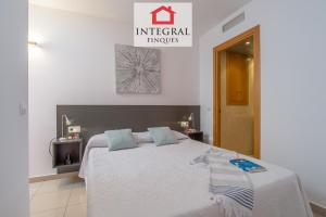 Posteľ alebo postele v izbe v ubytovaní Paradís Platja Apartment