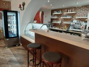Lounge nebo bar v ubytování Penzion - Restaurant U Zámku
