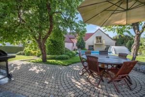 Vonkajšia záhrada v ubytovaní Hotel Garni Pod Skalkou