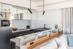 
A kitchen or kitchenette at Urban Suites
