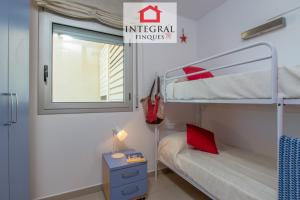 Posteľ alebo postele v izbe v ubytovaní Paradís Platja Apartment