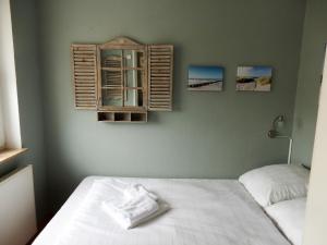 Postel nebo postele na pokoji v ubytování Ostseekrabbe-Timmendorfer Strand , strandnah , Wlan , Parkplatz