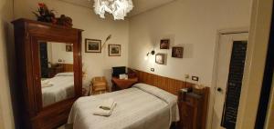 Postel nebo postele na pokoji v ubytování Hotel La Pace