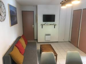 TV a/nebo společenská místnost v ubytování Appartement Solférino + 13 fotografií